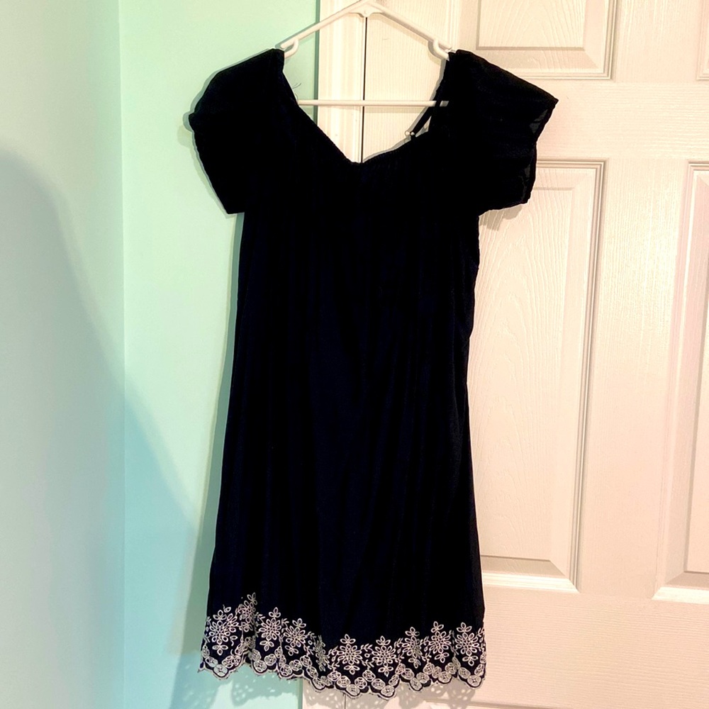 A black Old Navy dress with flower print on the bottom